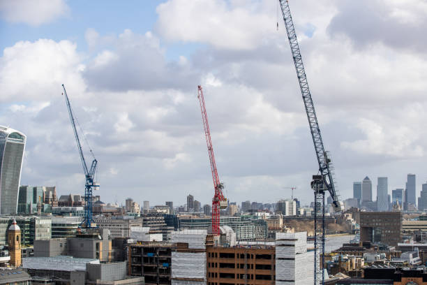 istock Cranes rising in London downtown district 1300082369