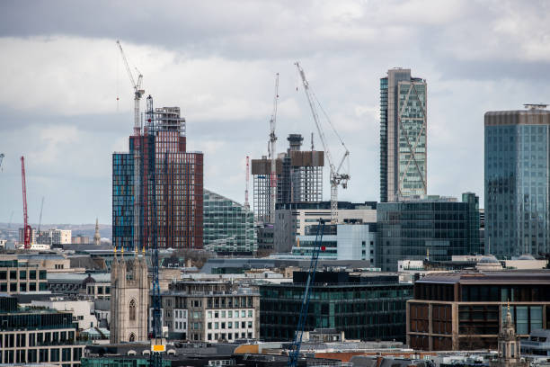 istock New construction sites with cranes rising in London downtown district 1300082372