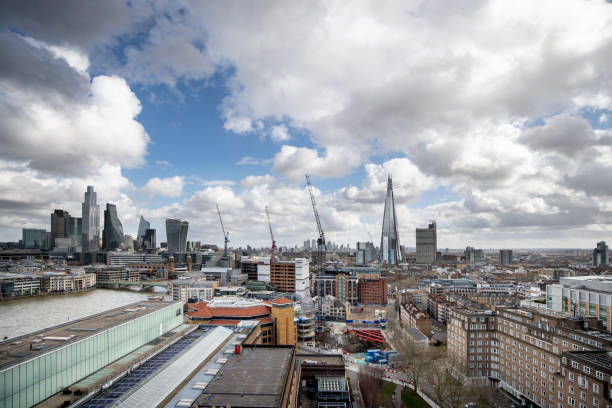 istock Construction site with cranes in London downtown district 1300082411