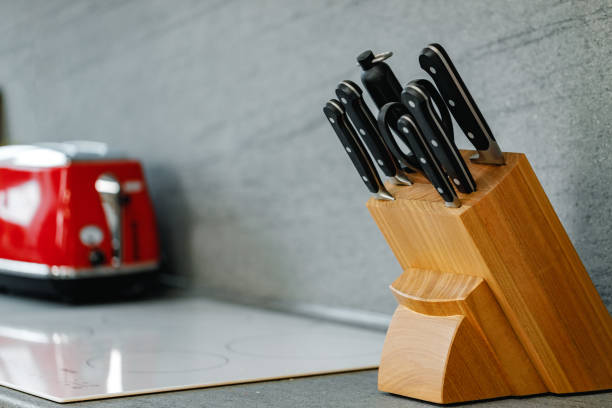 istock Set of knives on stand on kitchen counter 1300083804