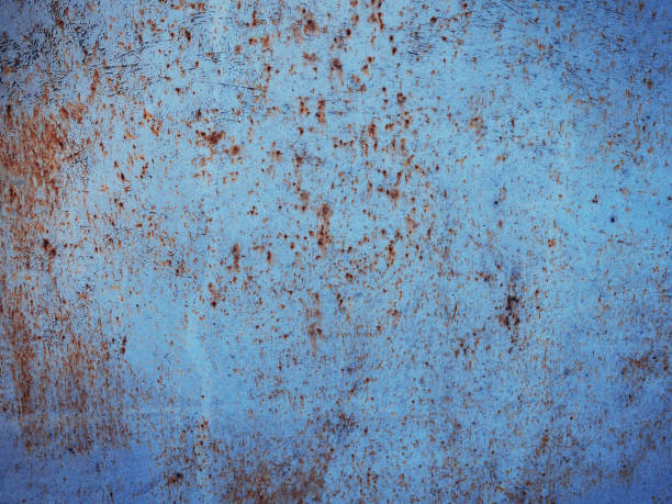 istock abstract texture Old painted wall with cracked paint 1300084901