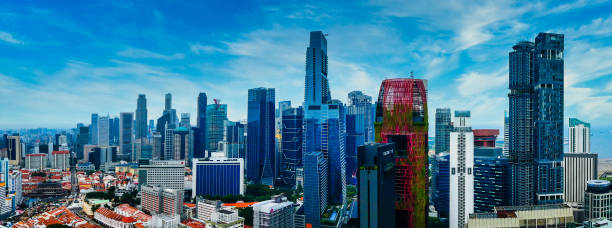 istock Singapore skyline - old and new buildings 1300086257