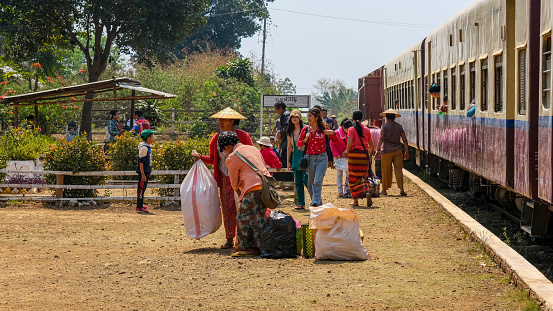 Crowded families around the train station, children, women, men.Hsipaw/MYANMAR,03/10/2020