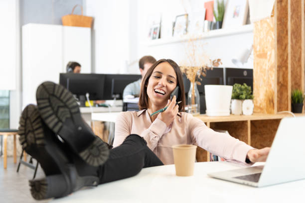 istock Relaxed woman talking on the phone 1300088949