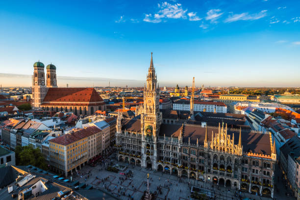 Aerial view of Munich, Germany Aerial view of Munich - Marienplatz, Neues Rathaus and Frauenkirche from St. Peter's church on sunset. Munich, Germany münchen stock pictures, royalty-free photos & images
