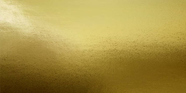 istock Gold Metallic Textured Background. Golden foil sheet for design or gift wrapper. 1300096757