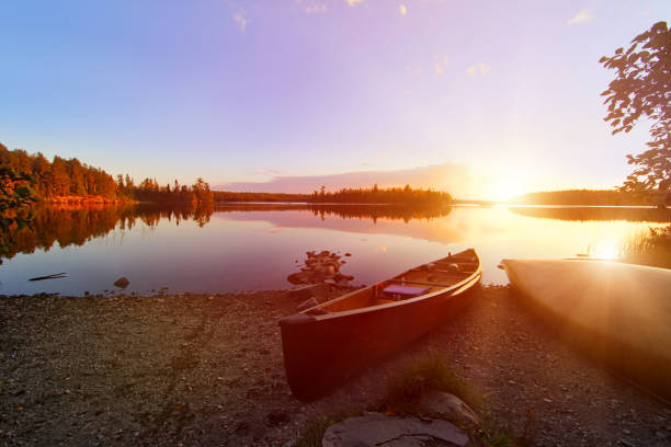 canoe campsite on wilderness lake - boundary waters canoe area imagens e fotografias de stock