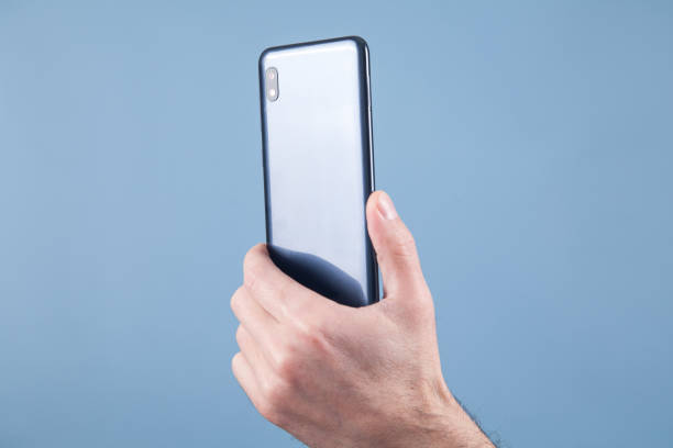 istock Man taking a picture with smartphone. 1300098151
