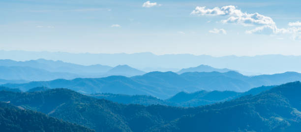 istock Landscape of mountains range with morning frog for mountain background. 1300099184