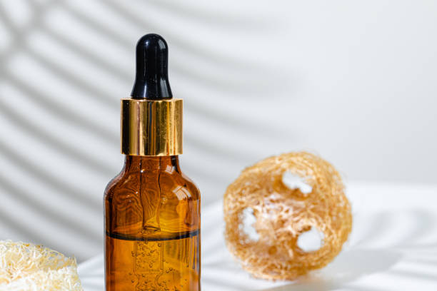 istock Skincare products containers on a white background with creative shadows 1300101276