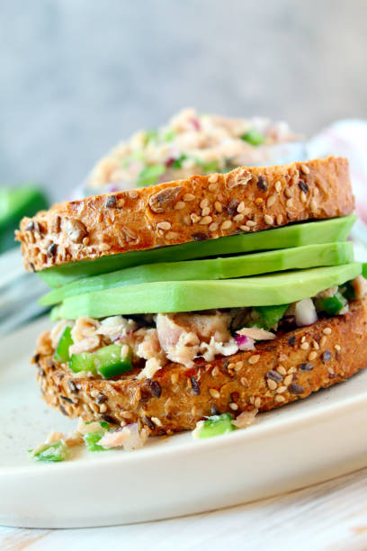 istock Sandwich with tuna, avocado and vegetables for snack or lunch. 1300104094