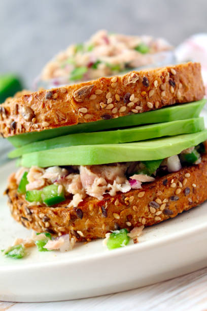 istock Sandwich with tuna, avocado and vegetables for snack or lunch. 1300104101