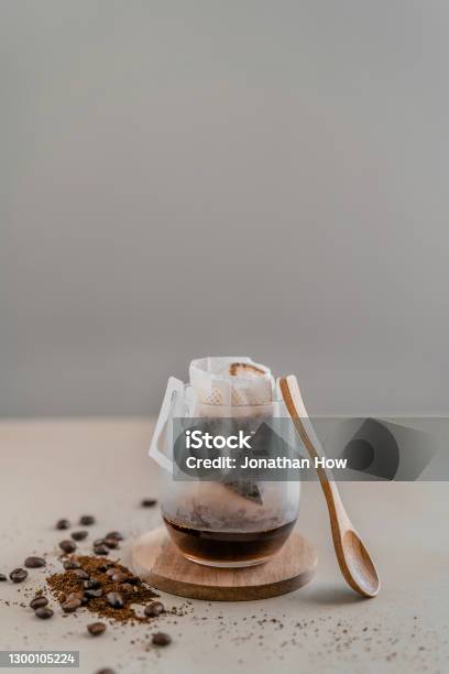 Preparing To Make Filtered Coffee Stock Photo - Download Image Now - Brewed Coffee, Coaster, Black Coffee