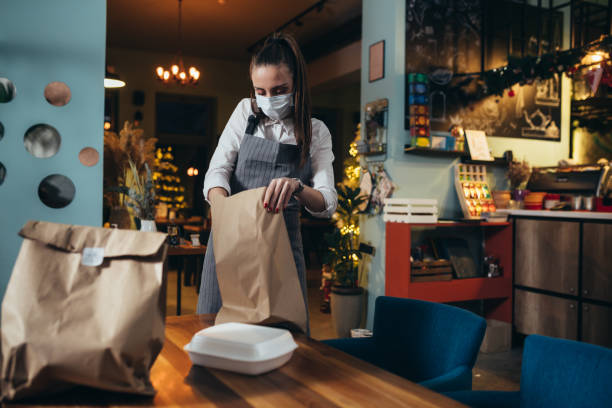 istock woman in restaurant 1300106099