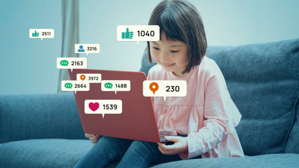 Asian little girl checking social networking service.
