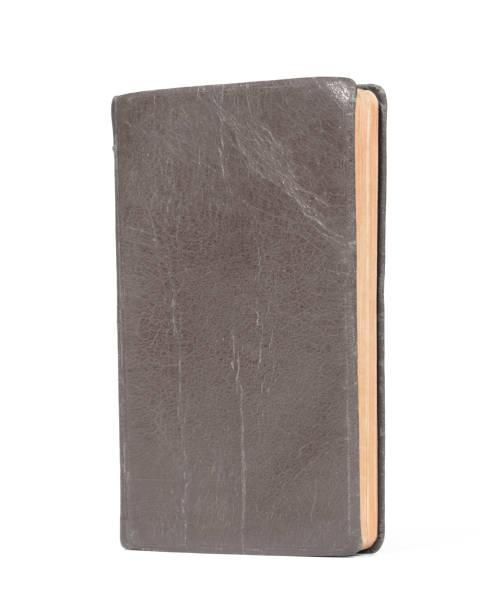 istock Small brown book, isolated on a white background 1300109680