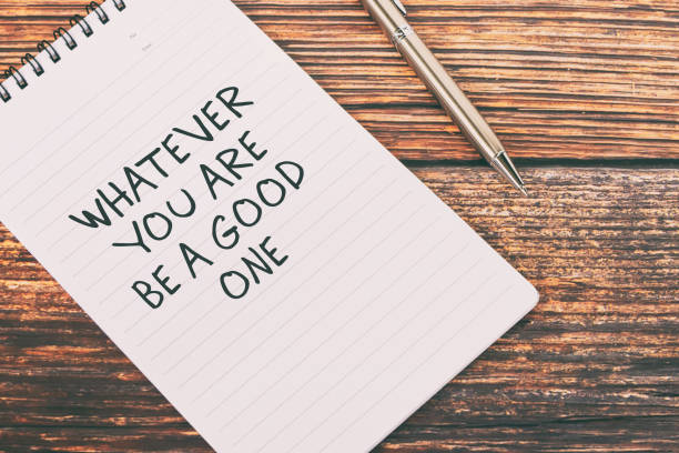 istock Life Quotes Whatever You Are Be A Good One Text on Note Pad 1300111675