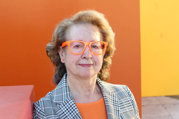 istock Mature entrepreneur wearing orange outfit 1300113390