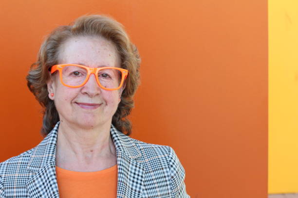 istock Mature entrepreneur wearing orange outfit 1300113424