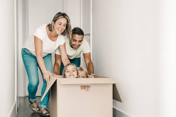 istock Happy Caucasian parents playing with children 1300113729