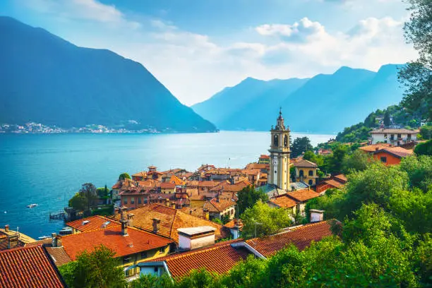 Photo of Como Lake, Sala Comacina bell tower from greenway trail. Italy, Europe.