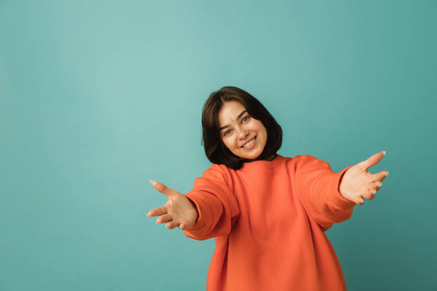 istock Caucasian woman's portrait isolated on blue studio background with copyspace 1300117972