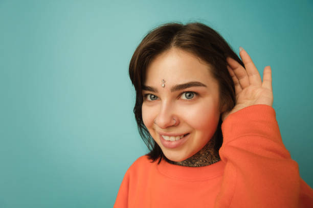 istock Caucasian woman's portrait isolated on blue studio background with copyspace 1300117980