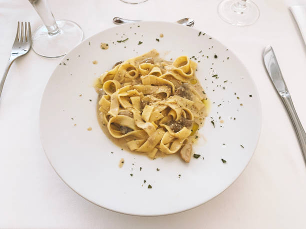 istock Italian tagliatelle with garlic sauce 1300118596