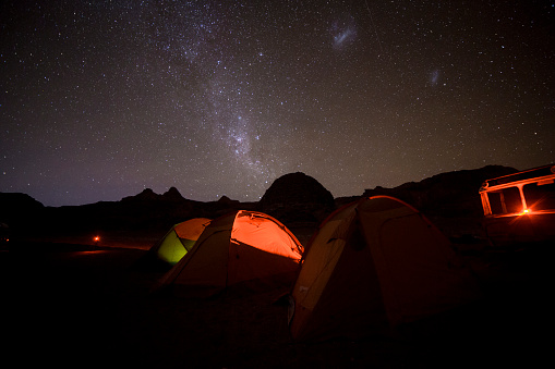 A group of adventurers camp at Cordillera del sal, a region of the Atacama Desert in Chile that is known for its starry night and view of the Milky Way.