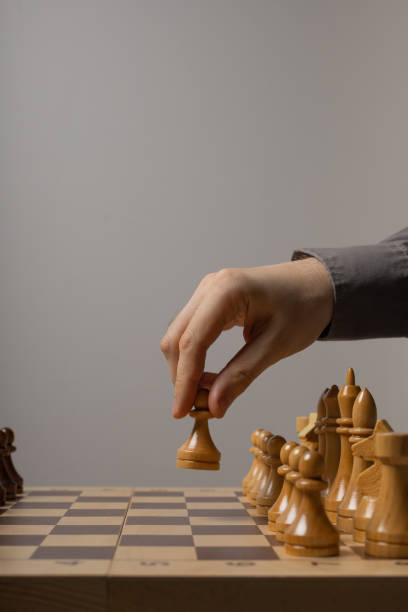 istock The first pawn move in a chess game 1300123009