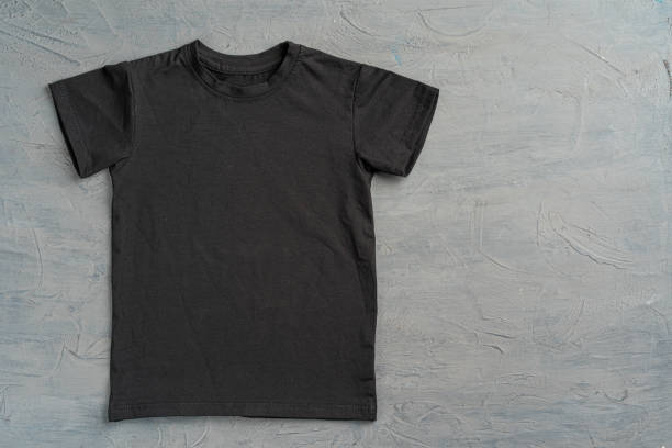 istock Black color plain t-shirt with copy space 1300125318