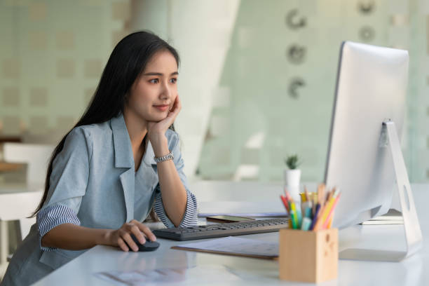 istock Businesswoman working with computer device in the office room. 1300126198