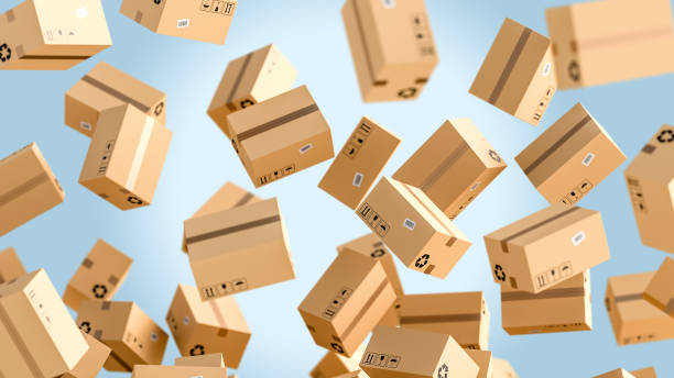 Flying cardboard boxes on blue backgraund, logistics and delivery concept stock photo