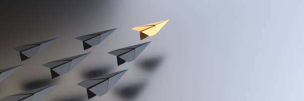 istock Leadership concept, yellow leader plane leading black planes, on black background with empty copy space on right side 1300131725