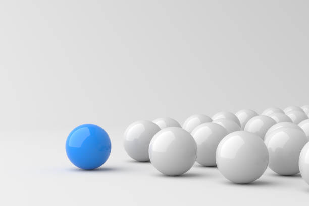 istock Leadership concept, blue leader ball leading white balls, on white background with empty copy space 1300132352