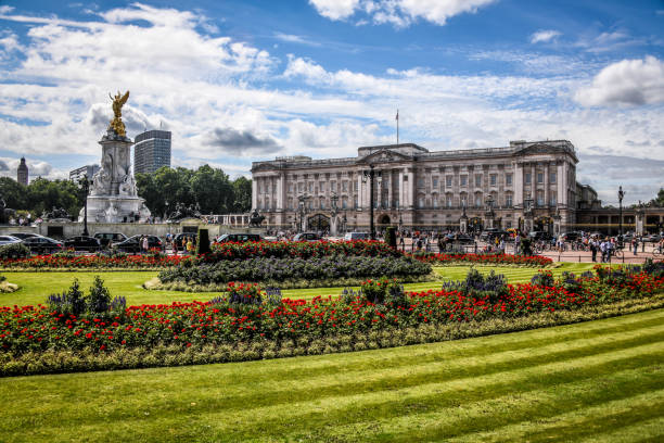 Buckingham Palace Park And Victoria Memorial In London, UK London, Uk - 8th of August, 2019 - A view of the park near Buckingham palace and Victoria Memorial. buckingham palace photos stock pictures, royalty-free photos & images