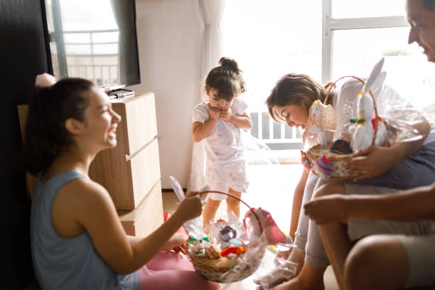 istock Family together enjoying easter goodies 1300136656