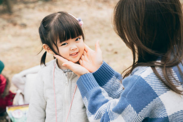 Mother and daughter in the park