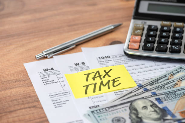 istock Tax Time note on tax forms. Tax concept 1300146662