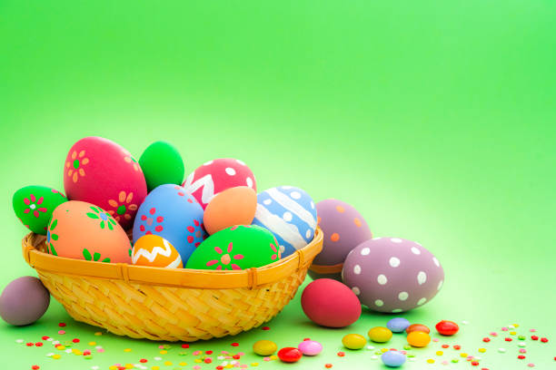 An image showing the concept of Easter with a pot full of eggs