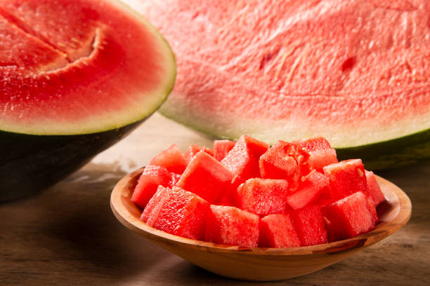 istock fresh watermelon cut into cubes on wooden bowl 1300146742
