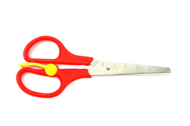 istock children's color scissors insulated on white 1300149511