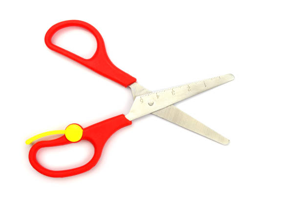 istock children's color scissors insulated on white 1300149636