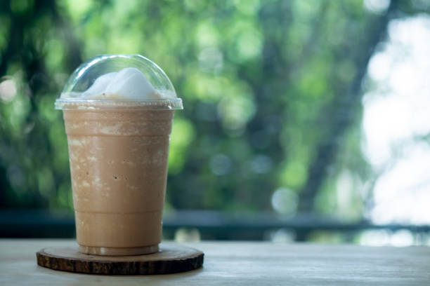 istock Delicious coffee smoothie in in plastic cup. Coffee time 1300150572