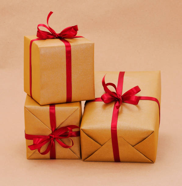 istock Gift boxs or present wrapped in craft paper. 1300154463