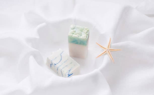 istock Handmade soap with a marine theme. White background 1300154854