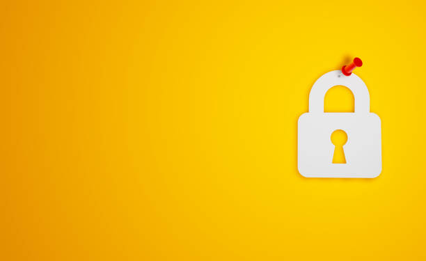 istock Pin Paper Padlock Symbol on Yellow Background 1300156651