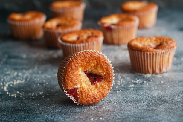 istock Delicious muffins with raspberries 1300156657