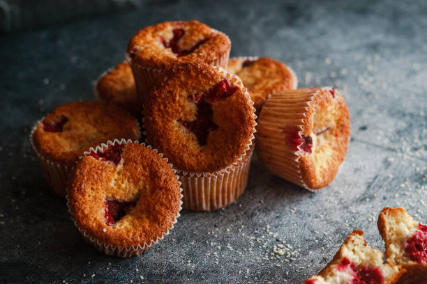 istock Delicious muffins with raspberries 1300156685