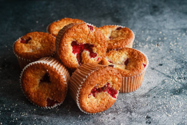 istock Delicious muffins with raspberries 1300156693